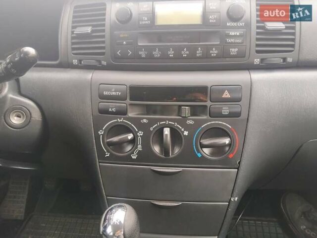 Белый Тойота Королла, объемом двигателя 1.4 л и пробегом 224 тыс. км за 5500 $, фото 16 на Automoto.ua