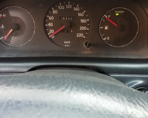 Белый Тойота Королла, объемом двигателя 1.3 л и пробегом 400 тыс. км за 2000 $, фото 16 на Automoto.ua