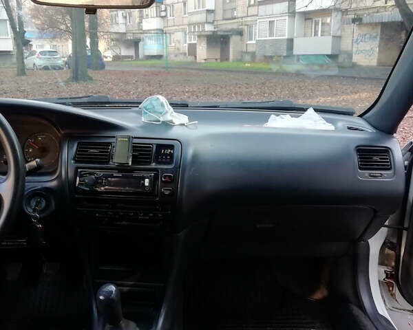 Белый Тойота Королла, объемом двигателя 1.3 л и пробегом 400 тыс. км за 2000 $, фото 17 на Automoto.ua