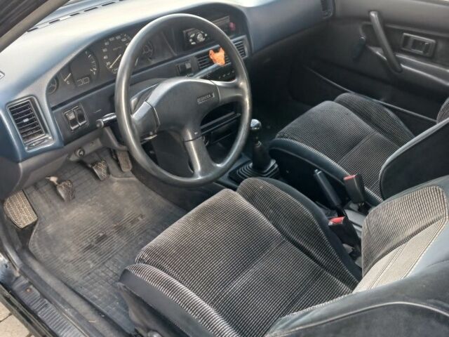 Чорний Тойота Королла, об'ємом двигуна 1.8 л та пробігом 549 тис. км за 1550 $, фото 4 на Automoto.ua