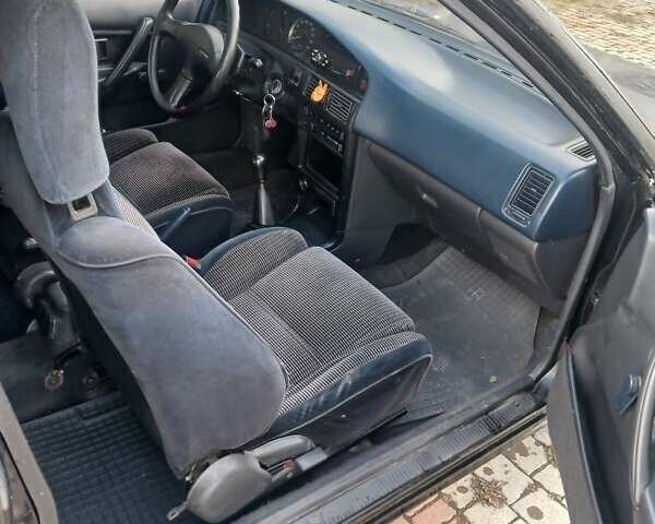 Черный Тойота Королла, объемом двигателя 1.8 л и пробегом 549 тыс. км за 1550 $, фото 4 на Automoto.ua