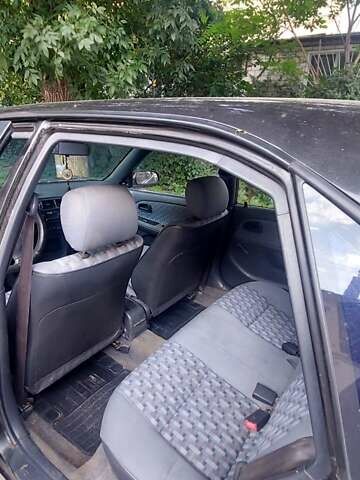 Черный Тойота Королла, объемом двигателя 1.33 л и пробегом 278 тыс. км за 2200 $, фото 6 на Automoto.ua