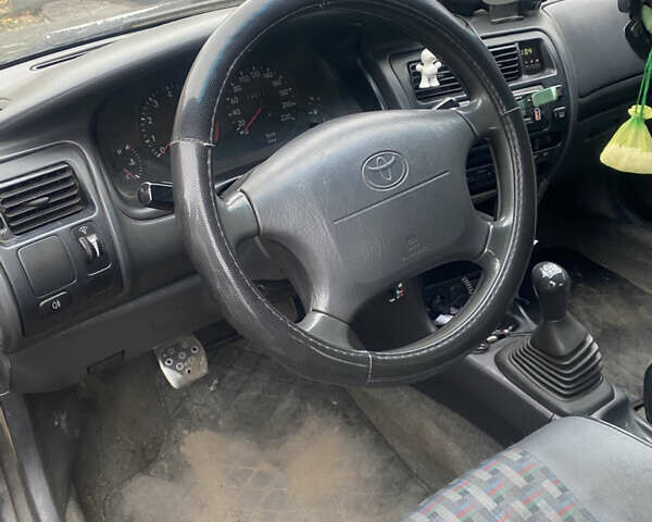 Черный Тойота Королла, объемом двигателя 1.33 л и пробегом 320 тыс. км за 2500 $, фото 2 на Automoto.ua