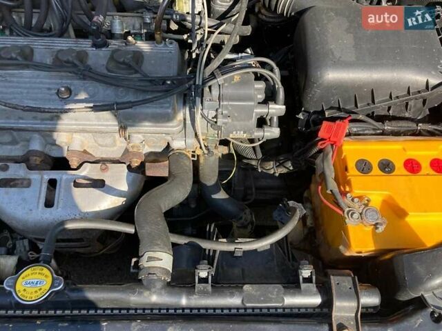 Черный Тойота Королла, объемом двигателя 1.33 л и пробегом 278 тыс. км за 2200 $, фото 4 на Automoto.ua