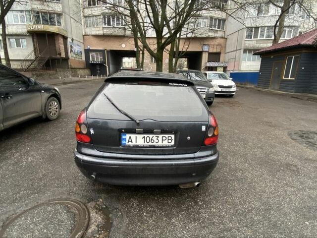 Черный Тойота Королла, объемом двигателя 1.4 л и пробегом 445 тыс. км за 2400 $, фото 4 на Automoto.ua