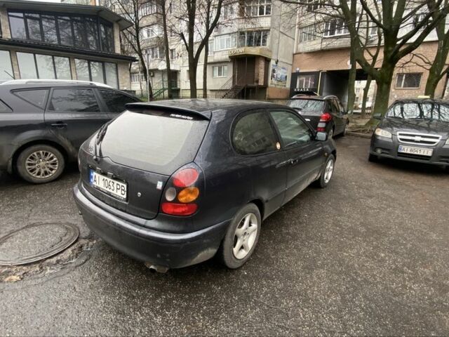 Черный Тойота Королла, объемом двигателя 1.4 л и пробегом 445 тыс. км за 2400 $, фото 5 на Automoto.ua