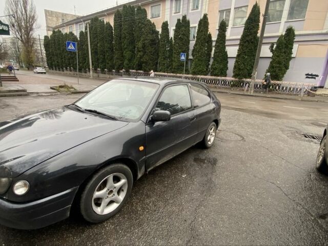 Черный Тойота Королла, объемом двигателя 1.4 л и пробегом 445 тыс. км за 2400 $, фото 2 на Automoto.ua