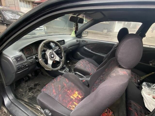 Черный Тойота Королла, объемом двигателя 1.4 л и пробегом 445 тыс. км за 2400 $, фото 7 на Automoto.ua