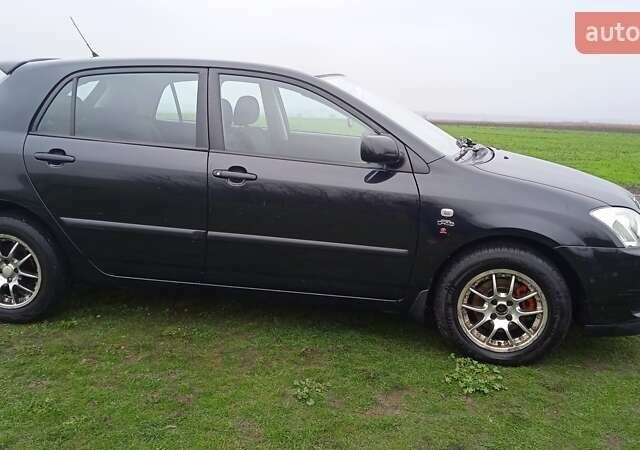 Черный Тойота Королла, объемом двигателя 2 л и пробегом 330 тыс. км за 3600 $, фото 8 на Automoto.ua