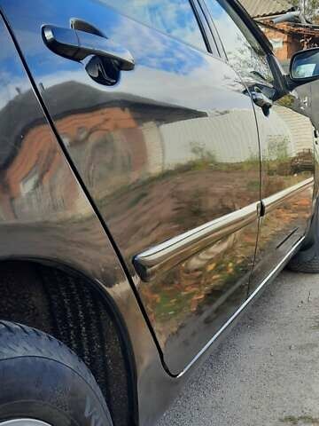 Черный Тойота Королла, объемом двигателя 1.6 л и пробегом 204 тыс. км за 4350 $, фото 3 на Automoto.ua