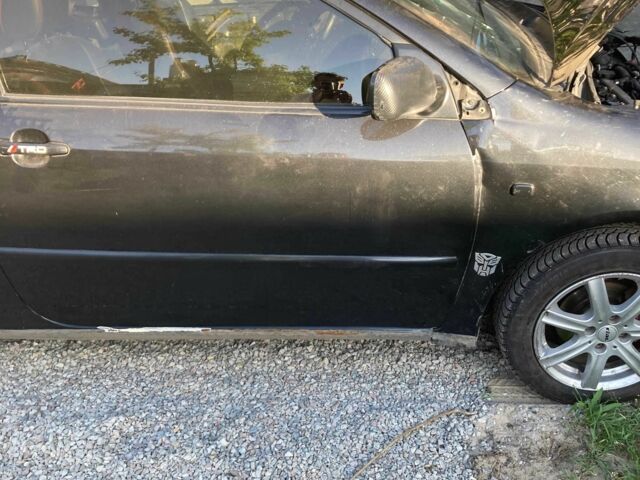 Черный Тойота Королла, объемом двигателя 1.4 л и пробегом 350 тыс. км за 2383 $, фото 9 на Automoto.ua