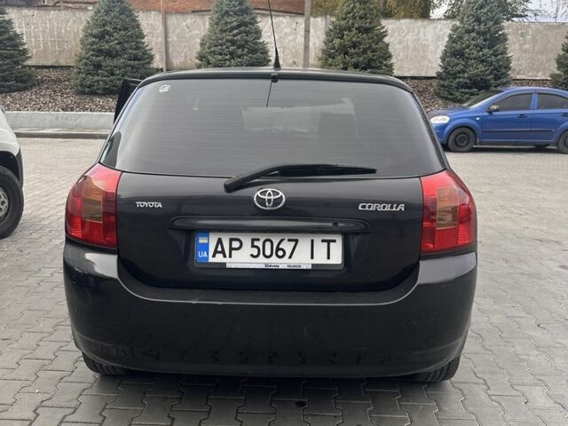 Чорний Тойота Королла, об'ємом двигуна 2 л та пробігом 311 тис. км за 3300 $, фото 2 на Automoto.ua