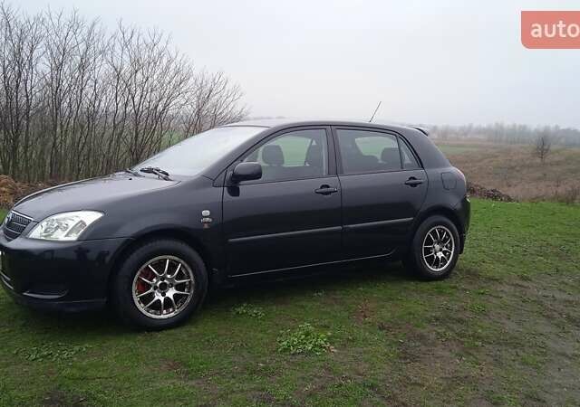 Черный Тойота Королла, объемом двигателя 2 л и пробегом 330 тыс. км за 3600 $, фото 9 на Automoto.ua