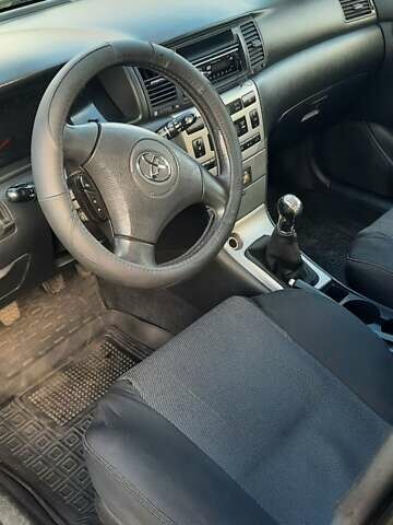 Черный Тойота Королла, объемом двигателя 1.6 л и пробегом 204 тыс. км за 4350 $, фото 7 на Automoto.ua