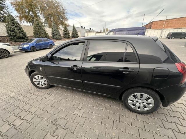 Чорний Тойота Королла, об'ємом двигуна 2 л та пробігом 311 тис. км за 3300 $, фото 3 на Automoto.ua