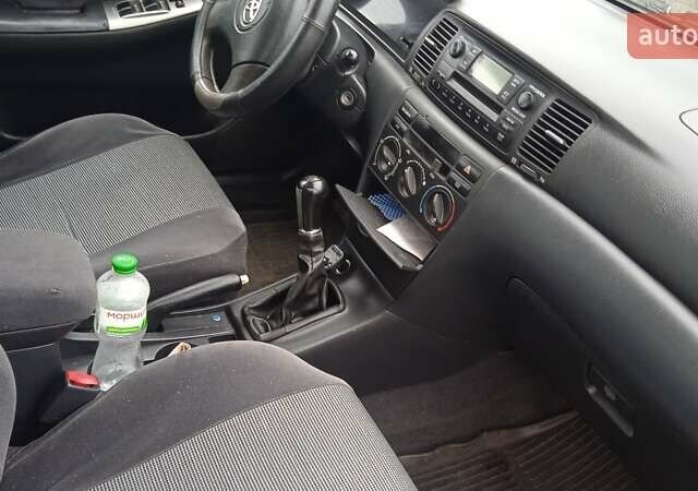 Черный Тойота Королла, объемом двигателя 2 л и пробегом 330 тыс. км за 3600 $, фото 5 на Automoto.ua