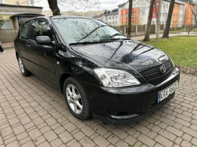 Черный Тойота Королла, объемом двигателя 2 л и пробегом 290 тыс. км за 1650 $, фото 4 на Automoto.ua