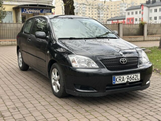 Черный Тойота Королла, объемом двигателя 2 л и пробегом 290 тыс. км за 1650 $, фото 1 на Automoto.ua