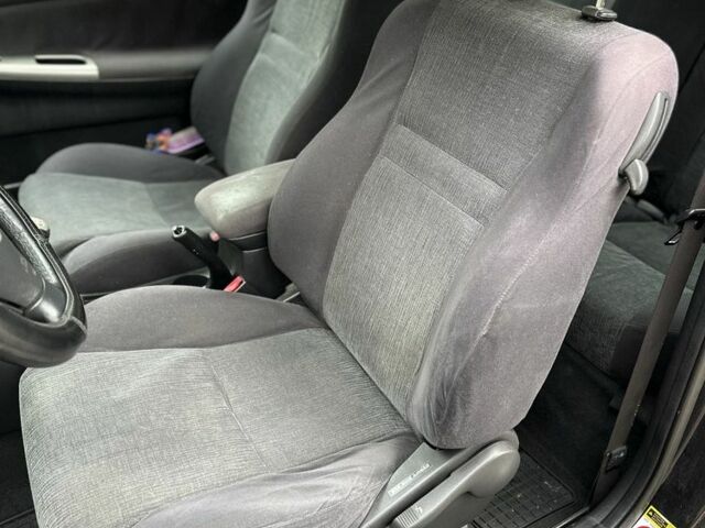 Черный Тойота Королла, объемом двигателя 2 л и пробегом 290 тыс. км за 1650 $, фото 10 на Automoto.ua