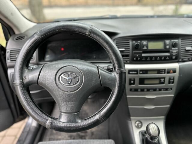 Черный Тойота Королла, объемом двигателя 2 л и пробегом 290 тыс. км за 1650 $, фото 13 на Automoto.ua