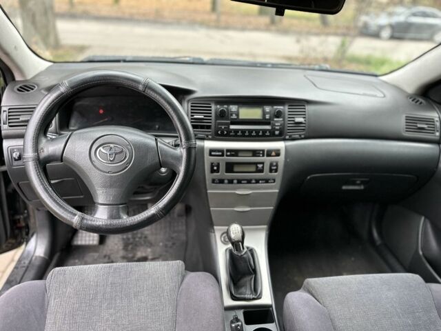 Черный Тойота Королла, объемом двигателя 2 л и пробегом 290 тыс. км за 1650 $, фото 7 на Automoto.ua