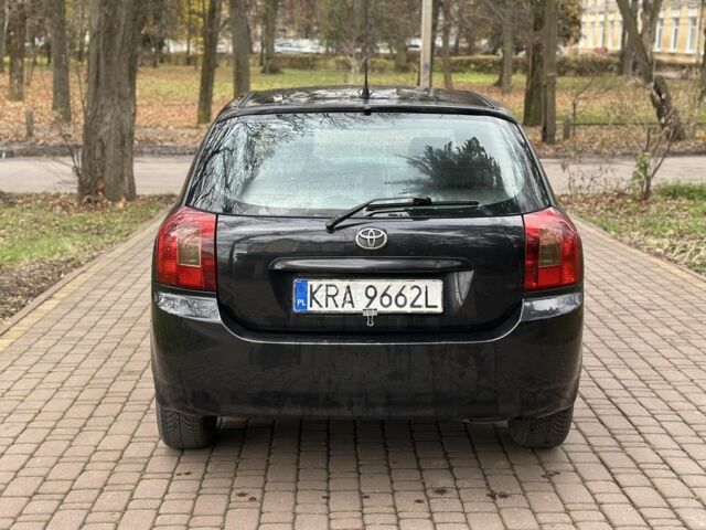 Черный Тойота Королла, объемом двигателя 2 л и пробегом 290 тыс. км за 1650 $, фото 3 на Automoto.ua