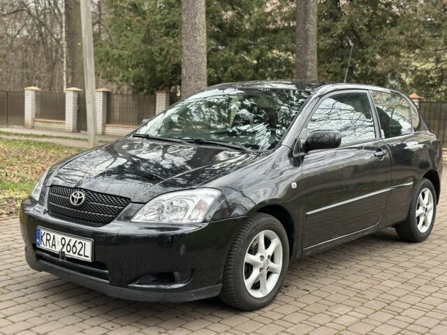 Черный Тойота Королла, объемом двигателя 2 л и пробегом 290 тыс. км за 1650 $, фото 2 на Automoto.ua