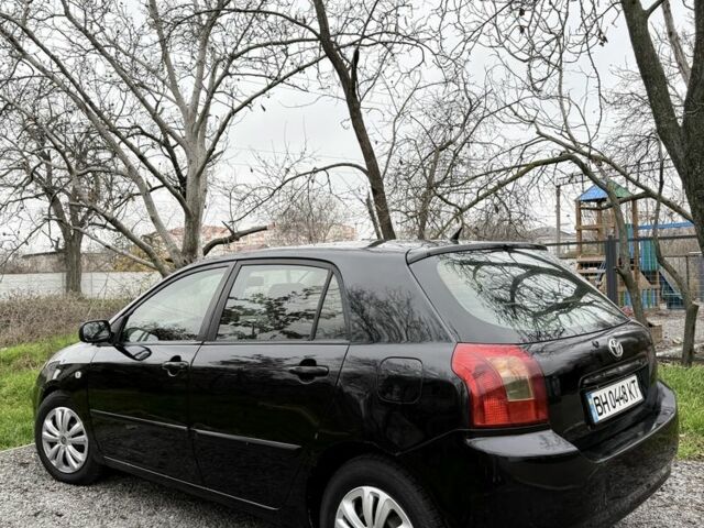Чорний Тойота Королла, об'ємом двигуна 2 л та пробігом 300 тис. км за 4200 $, фото 1 на Automoto.ua