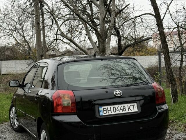 Чорний Тойота Королла, об'ємом двигуна 2 л та пробігом 300 тис. км за 4200 $, фото 3 на Automoto.ua