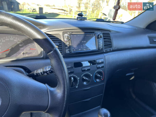 Черный Тойота Королла, объемом двигателя 1.4 л и пробегом 352 тыс. км за 4900 $, фото 6 на Automoto.ua