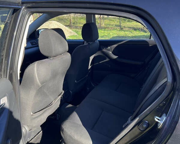 Черный Тойота Королла, объемом двигателя 1.4 л и пробегом 352 тыс. км за 4900 $, фото 9 на Automoto.ua