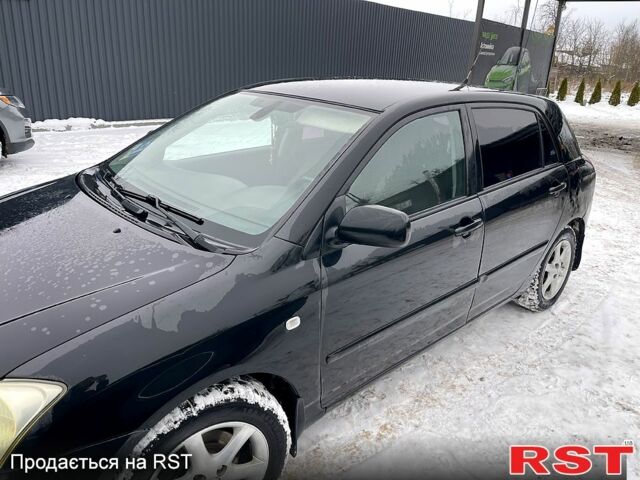 Чорний Тойота Королла, об'ємом двигуна 2 л та пробігом 409 тис. км за 4600 $, фото 3 на Automoto.ua