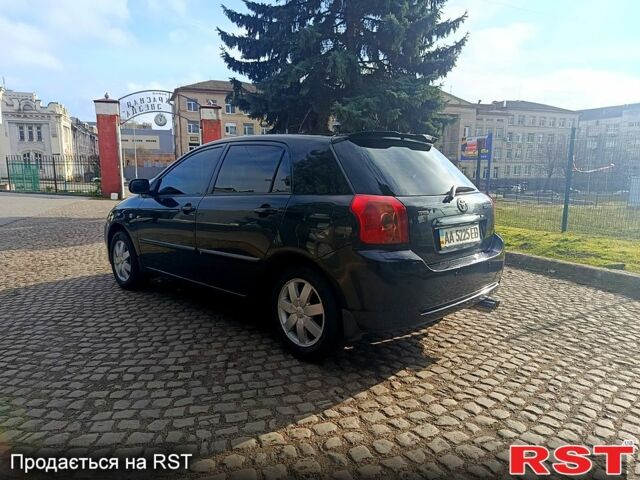 Черный Тойота Королла, объемом двигателя 1.6 л и пробегом 245 тыс. км за 5500 $, фото 1 на Automoto.ua
