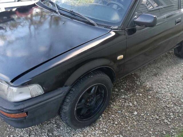 Черный Тойота Королла, объемом двигателя 1.3 л и пробегом 300 тыс. км за 800 $, фото 15 на Automoto.ua