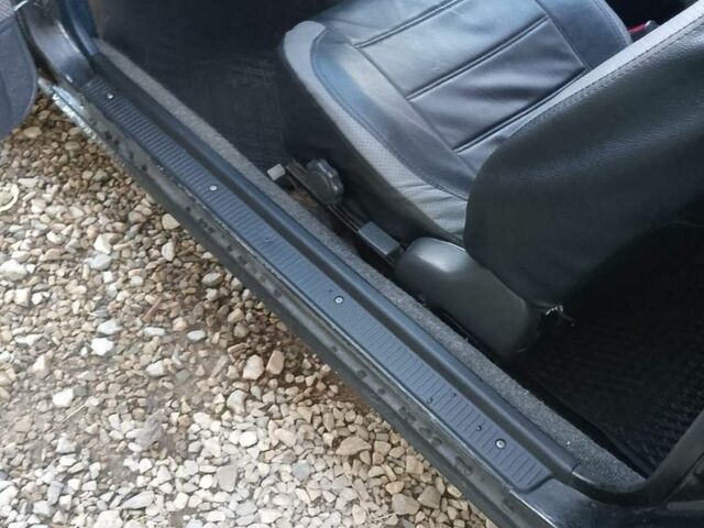 Черный Тойота Королла, объемом двигателя 1.3 л и пробегом 300 тыс. км за 800 $, фото 2 на Automoto.ua