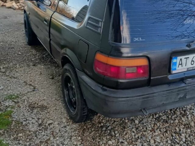 Черный Тойота Королла, объемом двигателя 1.3 л и пробегом 300 тыс. км за 800 $, фото 10 на Automoto.ua