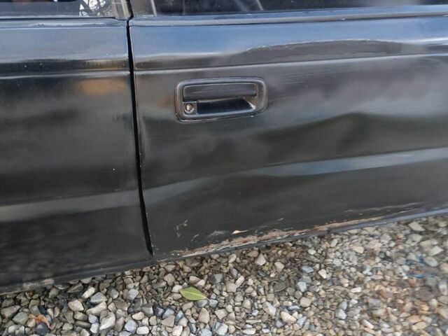 Черный Тойота Королла, объемом двигателя 1.3 л и пробегом 300 тыс. км за 800 $, фото 5 на Automoto.ua