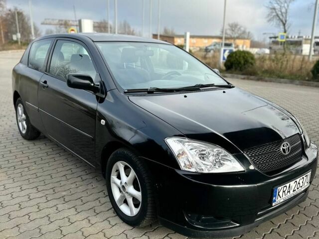 Чорний Тойота Королла, об'ємом двигуна 2 л та пробігом 2 тис. км за 2300 $, фото 2 на Automoto.ua