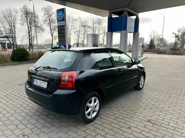 Чорний Тойота Королла, об'ємом двигуна 2 л та пробігом 2 тис. км за 2300 $, фото 4 на Automoto.ua