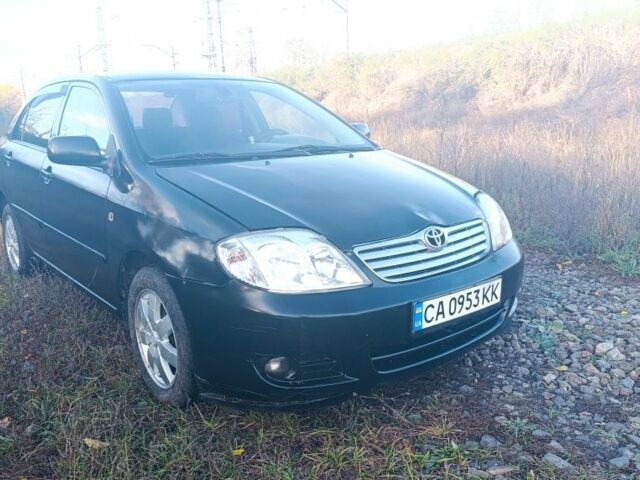Черный Тойота Королла, объемом двигателя 1.6 л и пробегом 200 тыс. км за 3200 $, фото 1 на Automoto.ua