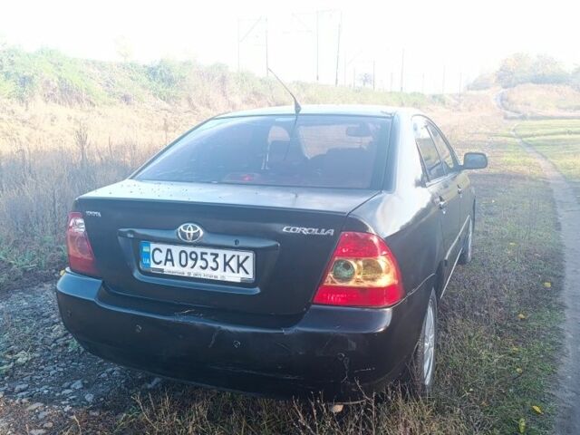 Черный Тойота Королла, объемом двигателя 1.6 л и пробегом 200 тыс. км за 3200 $, фото 3 на Automoto.ua