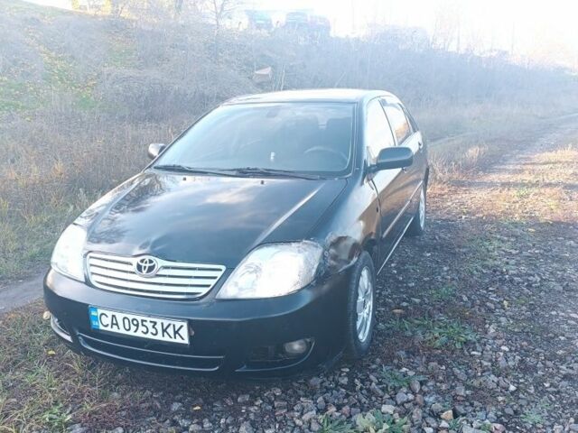 Черный Тойота Королла, объемом двигателя 1.6 л и пробегом 200 тыс. км за 3200 $, фото 2 на Automoto.ua