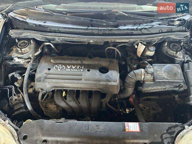Черный Тойота Королла, объемом двигателя 1.59 л и пробегом 521 тыс. км за 3537 $, фото 18 на Automoto.ua