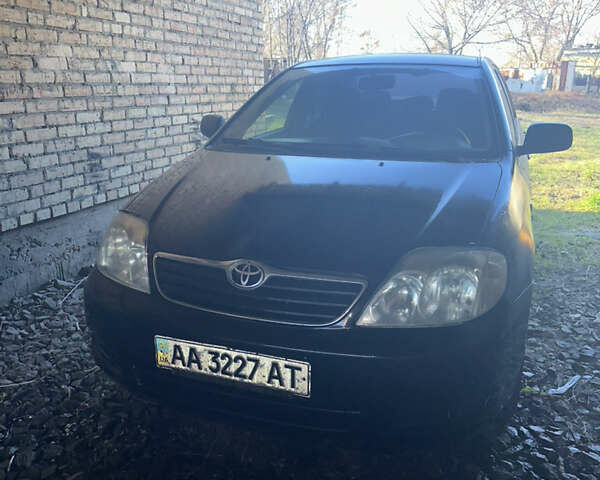 Черный Тойота Королла, объемом двигателя 1.59 л и пробегом 521 тыс. км за 3537 $, фото 1 на Automoto.ua