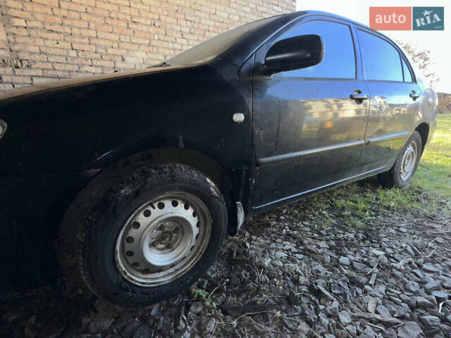 Черный Тойота Королла, объемом двигателя 1.59 л и пробегом 521 тыс. км за 3537 $, фото 2 на Automoto.ua