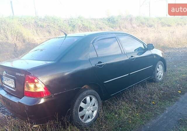 Черный Тойота Королла, объемом двигателя 1.6 л и пробегом 211 тыс. км за 3000 $, фото 6 на Automoto.ua
