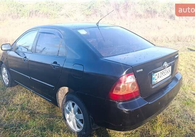 Черный Тойота Королла, объемом двигателя 1.6 л и пробегом 211 тыс. км за 3000 $, фото 2 на Automoto.ua