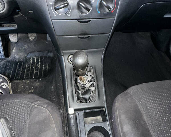 Черный Тойота Королла, объемом двигателя 1.59 л и пробегом 521 тыс. км за 3537 $, фото 14 на Automoto.ua