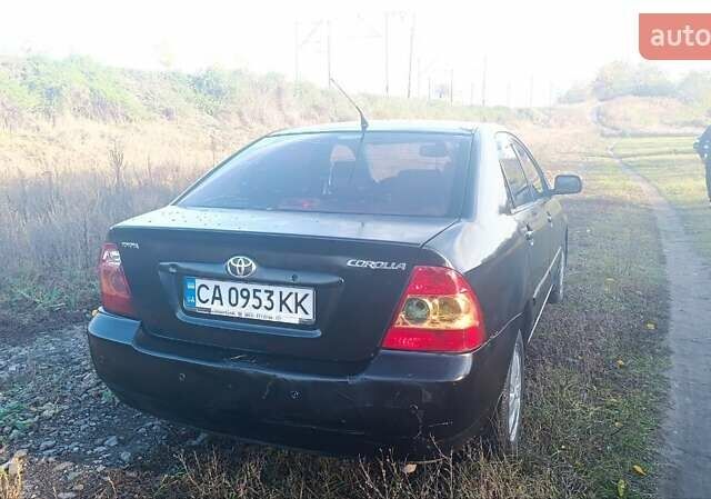 Черный Тойота Королла, объемом двигателя 1.6 л и пробегом 211 тыс. км за 3000 $, фото 4 на Automoto.ua