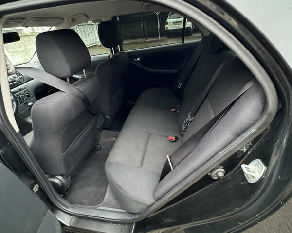 Черный Тойота Королла, объемом двигателя 1.6 л и пробегом 211 тыс. км за 6200 $, фото 7 на Automoto.ua